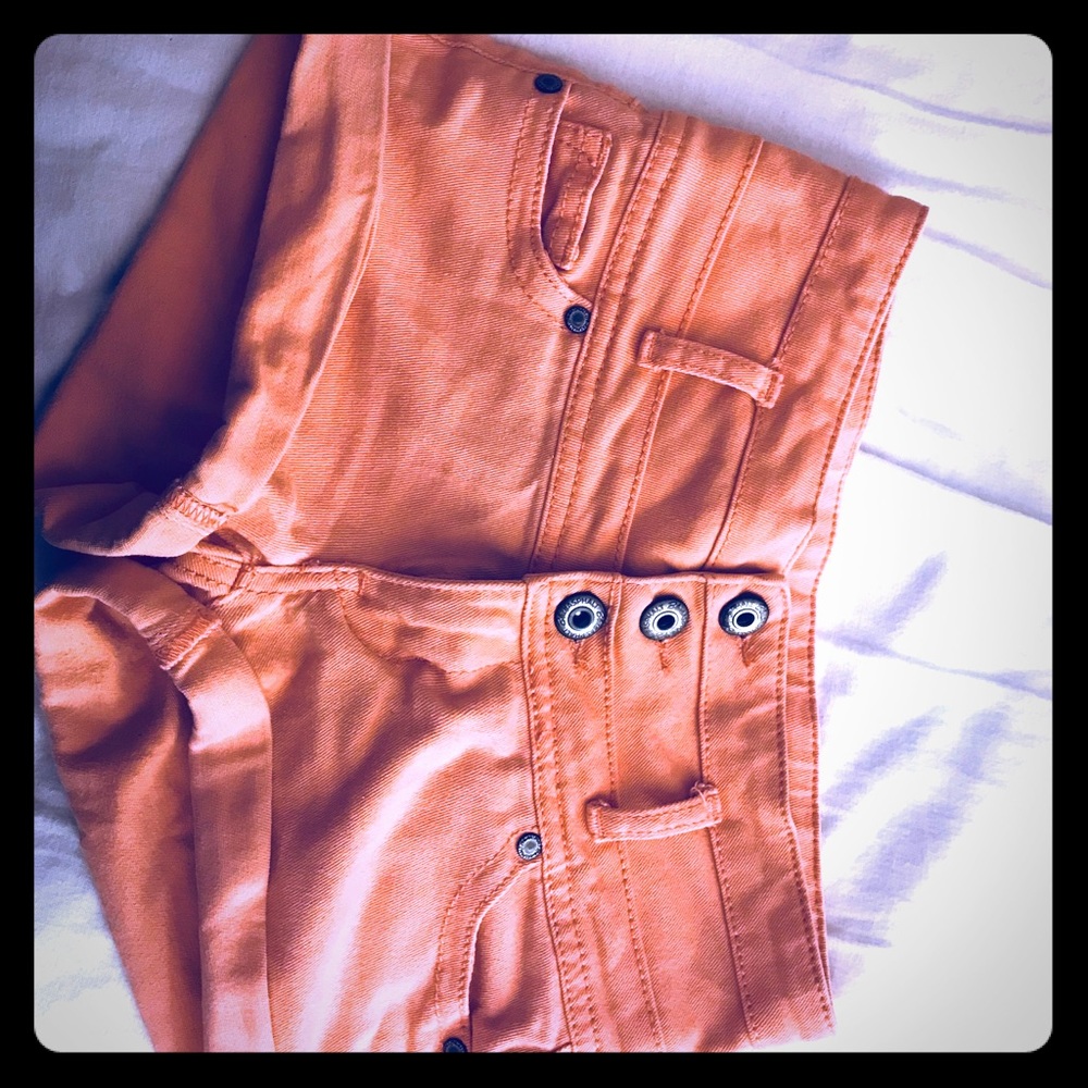 Salmon colored high waist short shorts